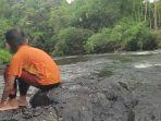 Aliran-Sungai-Tapin-di-Desa-Batu-Ampar-Kecamatan-Piani-Pemandian-Hanampak.jpg