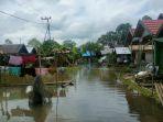 Banjir-merendam-jalan-di-Desa-Pahalatan-hst.jpg