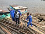 Barang-bukti-kayu-hasil-hutan-tanpa-dokumen-sah.jpg