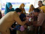 Bupati-HST-H-Aulia-Oktafiandi-saat-mencanangkan-PIN-polio-di-HST-11.jpg