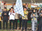 Bupati-Kotabaru-saat-pelepasan-peserta-pawai-taaruf-MTQ-ke-54-Tingkat-Kabupaten-Kotabaru.jpg