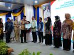 Bupati-Tala-H-Rahmat-Trianto-didampingi-Ketua-TP-PKK-Tala-Hj-Dian-Rahmat-1.jpg