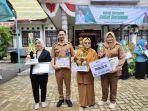 Camat-Batu-Ampar-Yudo-Restanto-Kades-Ambawang-Hayatul-Mursyida-kanan.jpg