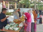 Dinas-Perdagangan-HSS-menggelar-pasar-murah-di-Desa-Longawang.jpg