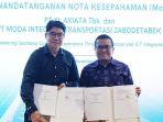 Direktur-Utama-PT-MITJ-Fuad-dan-Chief-Enterprise-Business-Officer-XL-Axiata-Feby.jpg