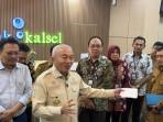 Gubernur-Kalsel-Muhidin-beri-pernyataan-soal-dana-mengendap.jpg