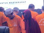 HADIR-Tersangka-pasangan-suami-istri-HM-dan-FA-d1.jpg