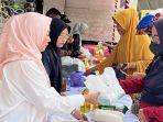 Hj-Aida-Muslimah-turut-berkecimpung-menjual-dagangan-Pasar-Murah.jpg