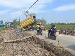Jalan-Kalumpang-di-Kabupaten-HSS-yang-terhubung-ke-Margasari-Tapin-diperbaiki.jpg