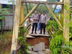 Jembatan-gantung-di-Desa-Tanah-Habang-terdampak-longsor.jpg