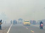Kabut-asap-menyelimuti-kawasan-Jalan-Gubernur-Syarkawi.jpg