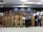 Kanwil-Kemenkum-Kalsel-secara-resmi-menyerahkan-hasil-harmonisasi-dua-Ranperda.jpg