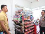 Kondisi-TKP-pencurian-dengan-kekerasan-di-sebuah-Minimarket-di-Kelurahan-Graha-Indah1.jpg