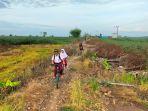 Kondisi-jalan-di-Desa-Siang-Gantung-HSS.jpg