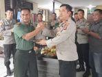 Koramil-se-Kodim-1003-HSS-ke-polsek-polsek-bawa-nasi-tumpeng-HUT-Bhayangkara-ke-77.jpg