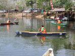 Lomba-balap-dayung-perahu-pada-Festival-Danau-Hatiwin-di-2023-lalu.jpg