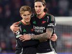 Martin-Odegaard-dan-Riccardo-Calafiori-andalan-Arsenal.jpg