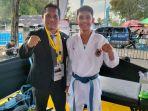 Muhammad-Aminuddin-kumite-60kg-putra-berhasil-menyabet-medali-perak-prapon-xxi-2023.jpg
