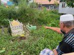 Orangtua-MS-saat-menunjukkan-lokasi-almarhum-cucunya-yang-disemayamkan-di-dekat-kediamannya.jpg