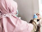 PCR-calon-haji-di-Covid-Center-RSUD-H-Usman-Dundrung-Tanjung-Tabalong-Kamis-09062022.jpg