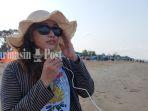 PELANCONG-menikmati-sejuknya-udara-di-pesisir-Pantai-Salaant-saef.jpg