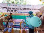 PJ-Bupati-Tala-H-Syamsir-Rahman-meneteskan-vaksin-polio.jpg
