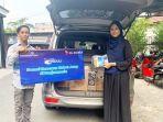 PT-XL-Axiata-Tbk-XL-Axiata-memberikan-bantuan-kepada-masyarakat-terdampak-kabut-asap.jpg