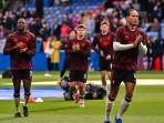 Para-pemain-Liverpool-melakukan-pemanasan-menjelang-kick-off-laga-Liga-Inggris.jpg