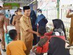Pelaksana-Tugas-Plt-Bupati-Kapuas-HM-Nafiah-Ibnorsaat-menyapa-anak-anak.jpg