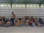 Pelipatan-kertas-suara-untuk-Kabupaten-Banjar-di-gudang-Logistik-KPU.jpg