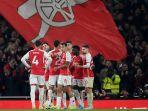 Pemain-Arsenal-merayakan-gol-pada-pertandingan-sepak-bola-Liga-Inggris.jpg