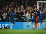 Pemain-Chelsea-memberikan-ucapan-selamat-kepada-rekannya.jpg