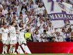Pemain-Real-madrid-merayakan-gol-di-hadapan-fansnya.jpg