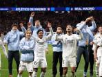 Pemain-Real-madrid-merayakan-kemenangan-di-dapan-para-pendukungnya.jpg