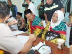 Pemeriksaan-Kesehatan-jemaah-calon-haji-kloter-14-di-asrama-haji-Banjarmasin-Kamis-3052024.jpg