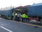 Penampakan-kabin-truk-tronton-remuk-dalam-kecelakaan-lalu-lintas-tabrakan-antar-dua.jpg