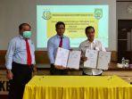 Penandatanganan-MOU-antara-DKP3-Balangan-dan-Kejari.jpg