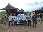 Penyerahan-mobil-Suzuki-Ertiga-kepada-Syahril-oleh-Pimpinan-Cabang-Branch-Office-BRI-Batulicin.jpg