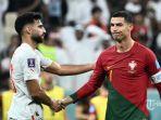 Penyerang-Portugal-Cristiano-Ronaldo-menyapa-bek-Swiss-Eray-Comert.jpg