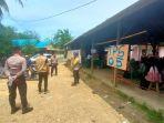 Personel-Polres-Tabalong-melakukan-pengamanan-pada-TPS-05-di-Desa-Kasiau.jpg