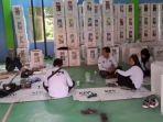 Petugas-KPPS-di-TPS-17-Kelurahan-Ulu-Benteng-usai-mengembalikan-logistik-Pemilu-2024.jpg