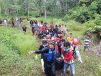 Petugas-evakuasi-korban-tenggelam-di-Desa-Mekasari-kabupaten-tanah-bumbu-Tanbu-14052022-1.jpg