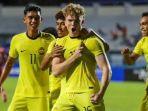 Potret-pemain-Timnas-Malaysia-Fergus-Tierney-setelah-mencetak-gol.jpg