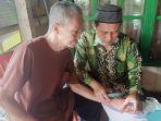 Proses-biometric-oleh-petugas-Kemenag-HSS.jpg