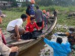 Proses-evakuasi-jasad-korban-tenggelam-di-Sungai-Alalak.jpg