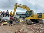 Proses-evakuasi-sekaligus-pembersihan-toko-alfamart-km-14-gambut.jpg