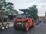 Proses-pengaspalan-jalan-Norman-Umar-A-Yani-Kabupaten-HSU.jpg