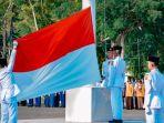 Prosesi-pengibaran-Bendera-Merah-Putih-pada-saat-Upacara-Peringatan-Hari-Sumpah-Pemuda.jpg