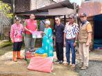 Rombongan-Pemkab-Tala-bersama-PMI-Tala-menyalurkan-bantuan-kepada-korban-puting-beliung.jpg
