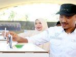 Saidi-Mansyur-beserta-isteri-menyalurkan-hak-pilihnya-diTPS-005-di-Desa-Madurejo.jpg